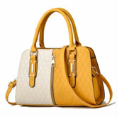 Elegant mustard yellow and cream handbag